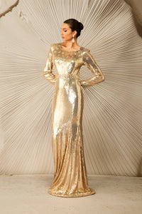فستان ذهبي مزين بالترتر