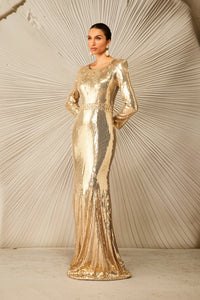 فستان ذهبي مزين بالترتر